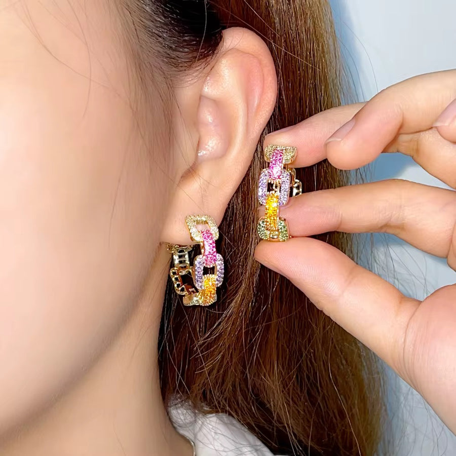 Ms Prims and proper earrings