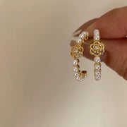 Hello Queen Pearls hoops.