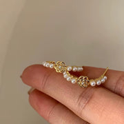 Hello Queen Pearls hoops.